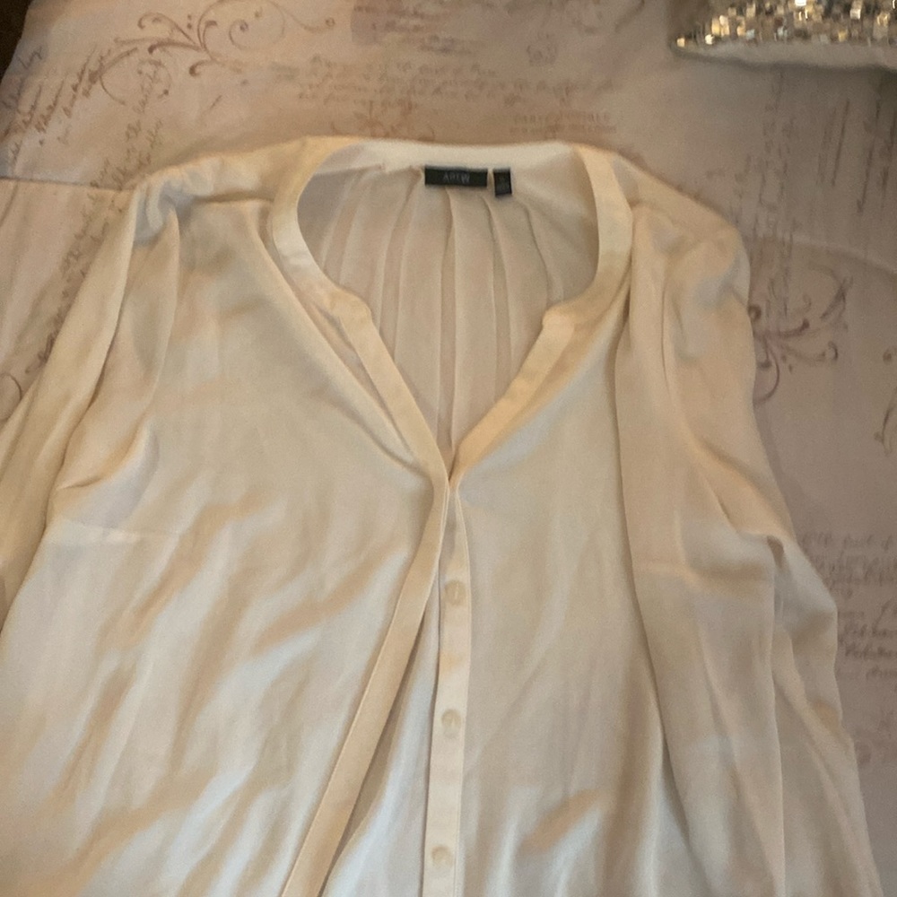 Off white blouse with buttons and v neck.  Apt 9 kohls brand.  New with tag